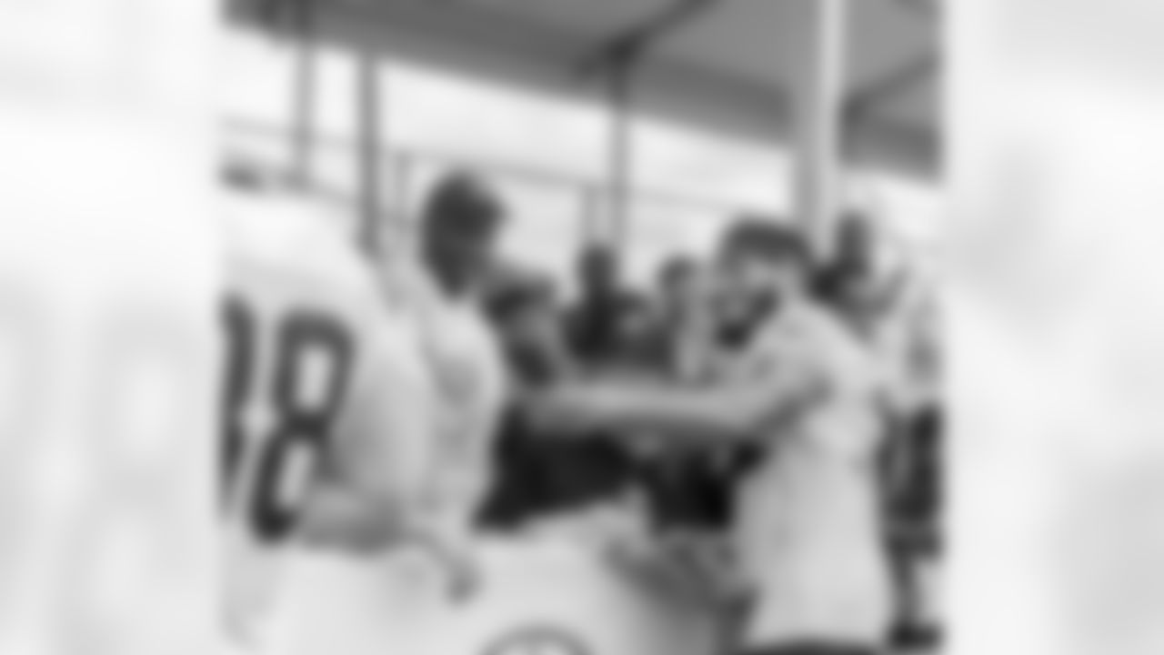 New Orleans Saints running back Abram Smith greets fans at 2022 Saints Training Camp presented by Rouses Markets on Thursday, August 11 at the Ochsner Sports Performance Center.