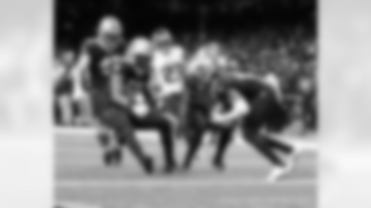 New Orleans Saints players in action during their 2022 Week 15 game against the Atlanta Falcons.