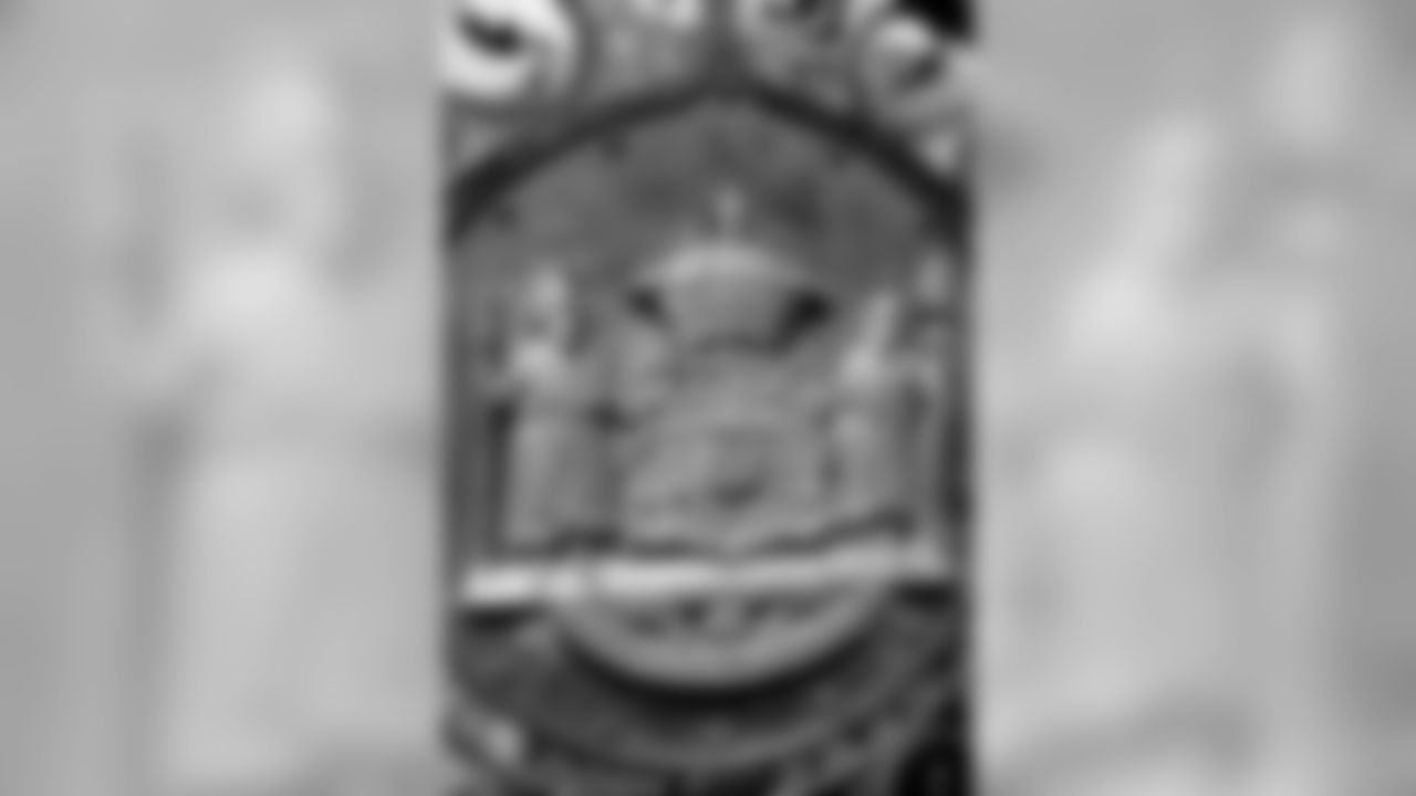 A symbol of Hawaiian royalty is seen on the gates of the Hulie'e Palace, the former summer home for Hawaiian royalty, Wed, Jan. 16, 2019, in Kailua Kona, Hawaii. NFL football center Max Unger grew up on the Big Island and spent his youth around the Kailua Kona area. (Marco Garcia for the New Orleans Saints)
