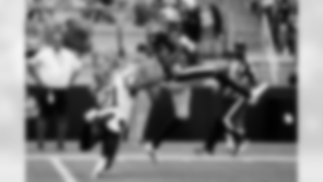 New Orleans Saints players in action during their 2022 Week 3 game against the Carolina Panthers.