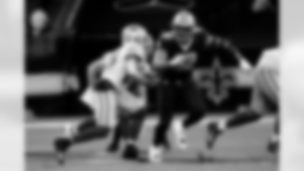 Check out photos of New Orleans Saints defensive end Marcus Davenport in action during the 2020 NFL season.