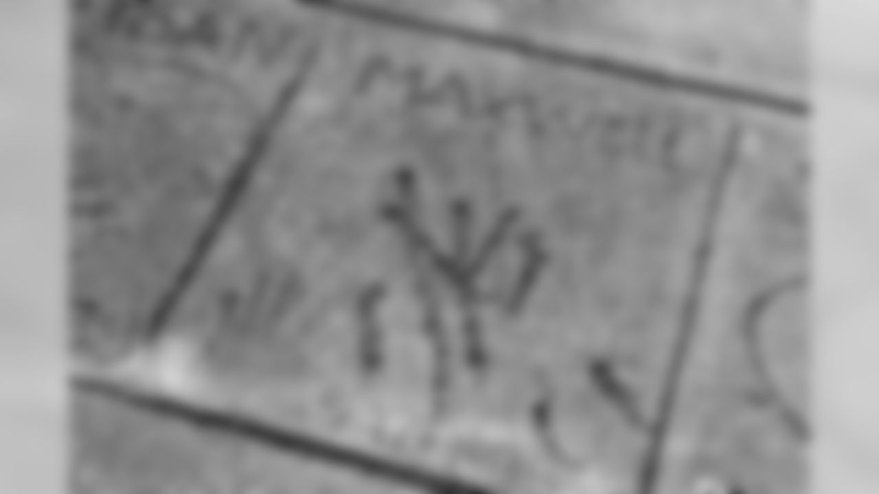 A youthful signature of NFL center Max Unger is carved into the cement of the sidewalk next to the Unger family home at the McCandless Ranch, Wed, Jan. 16, 2019, in Hookena, Hawaii. Max Unger grew up on his family's McCandless Ranch, a 7000 acre working cattle ranch that starts on the slopes of Mauna Loa stretches down to Hookena Beach. According to family, Max spent time riding horses and working on the ranch. (Marco Garcia for the New Orleans Saints)