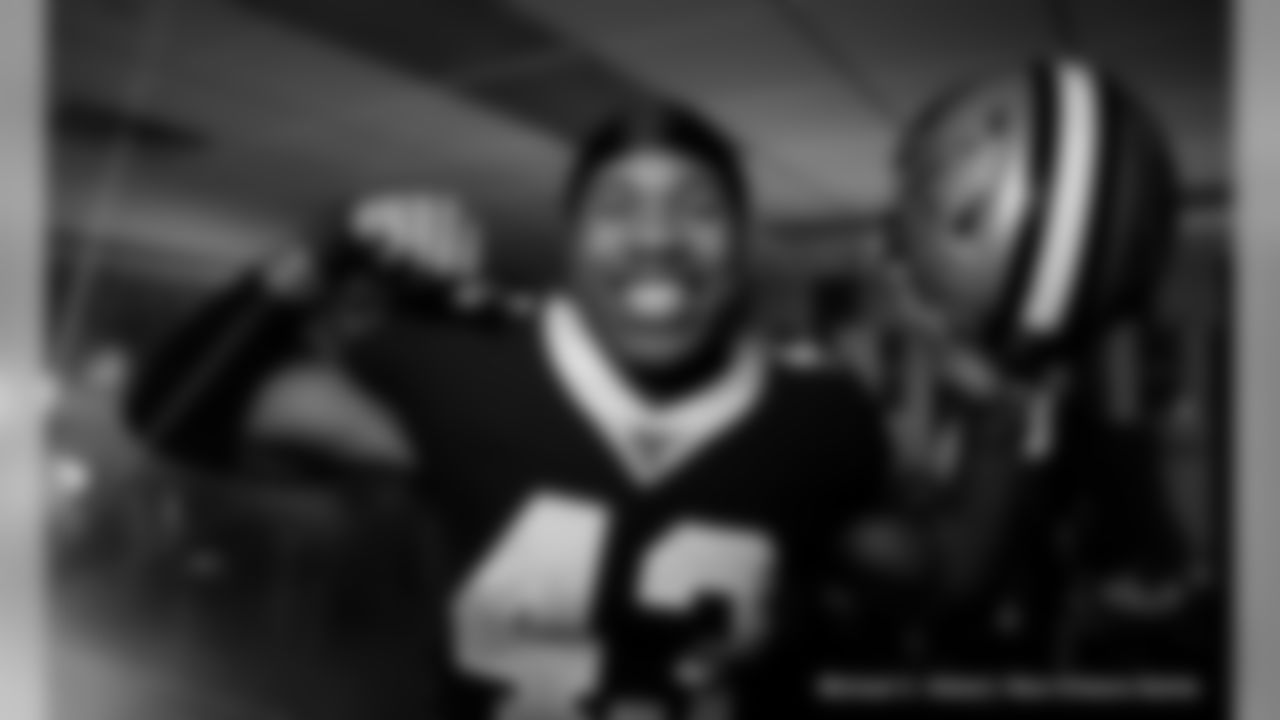 The Saints locker room turned into a club following wins in 2019. Safety Marcus Williams celebrates after one of New Orleans' victories.