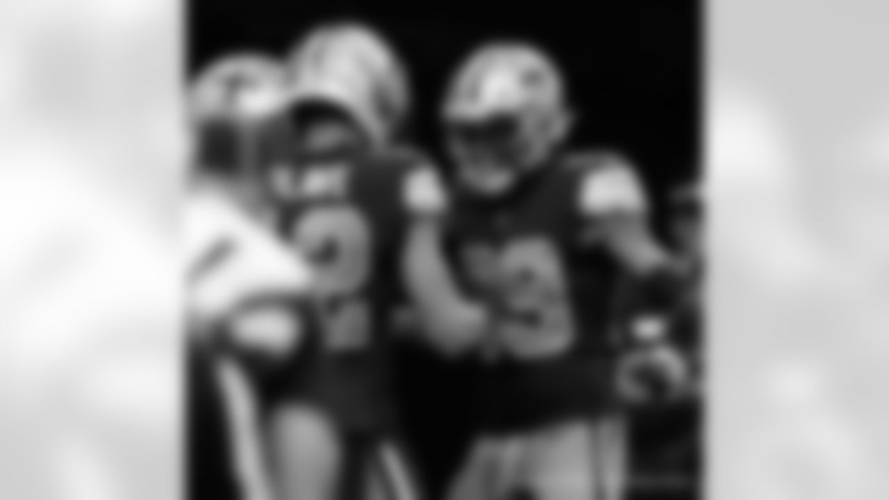 New Orleans Saints players in action during their 2022 Week 11 game against the Los Angeles Rams.