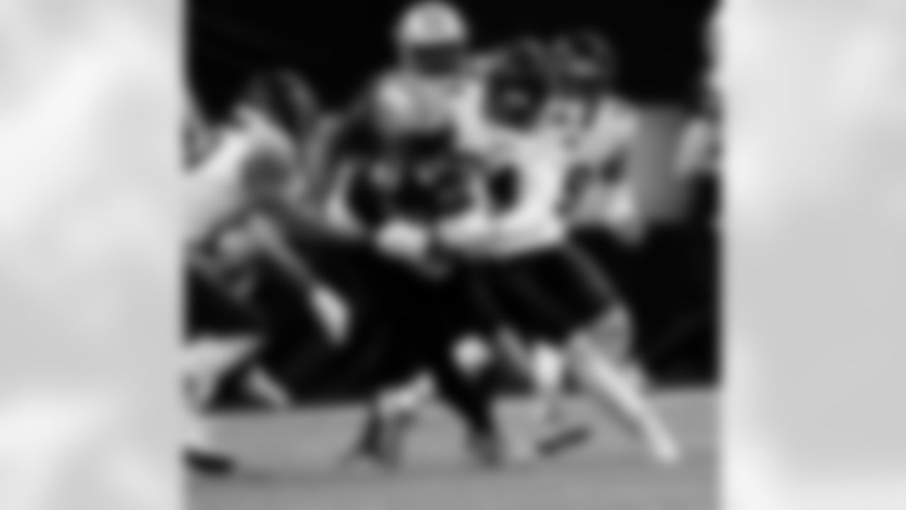 Game action photos from the New Orleans Saints vs. Chicago Bears matchup in the Wild Card round of the 2020 NFL playoffs.