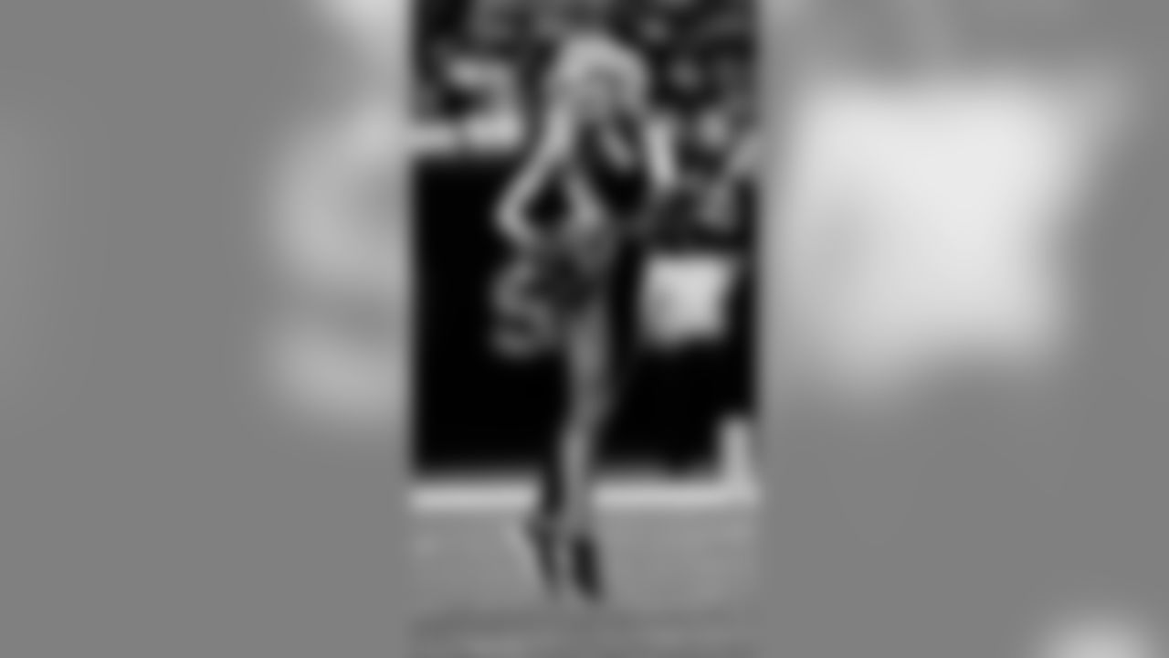 Check out photos of Saintsations member Gabby in action during 2019 Saints NFL season.