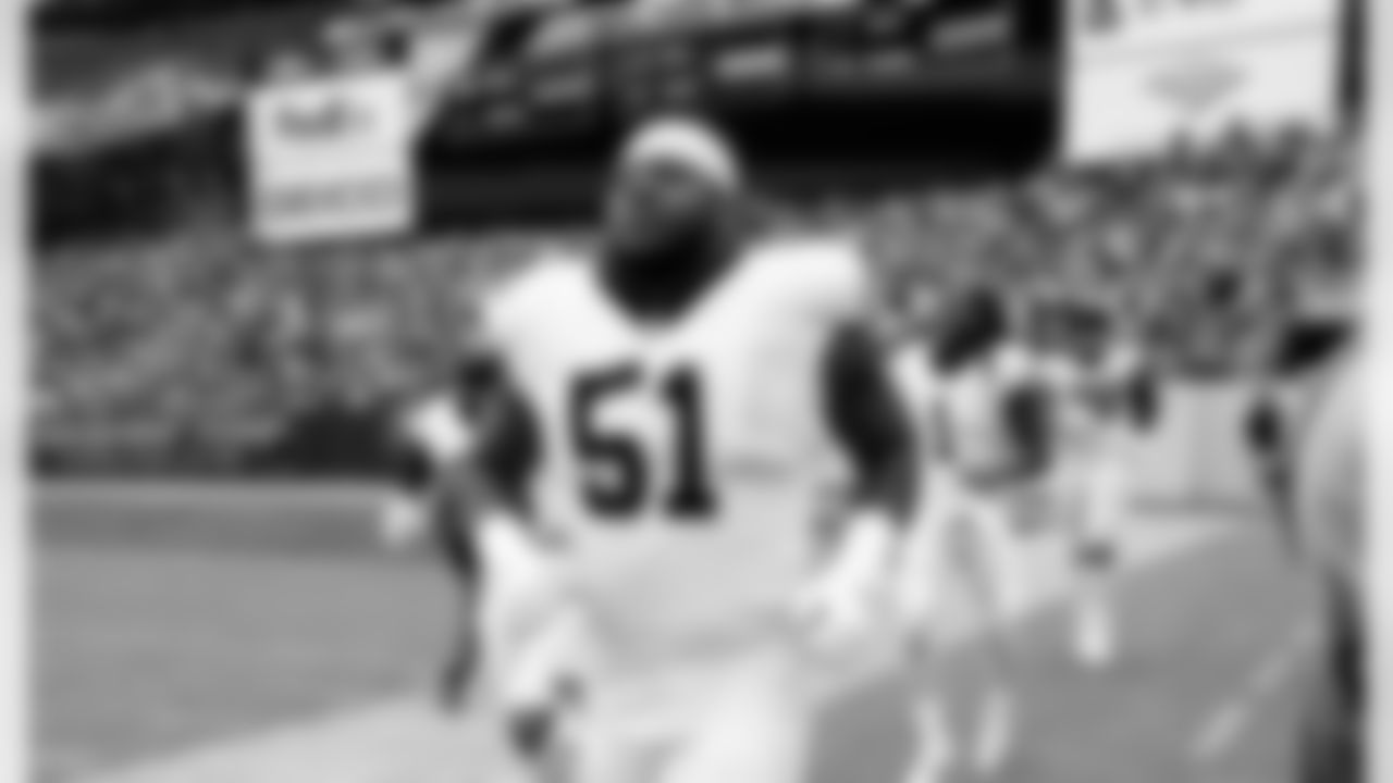 Check out photos of the New Orleans Saints offensive linemen in action during the 2021 NFL season.