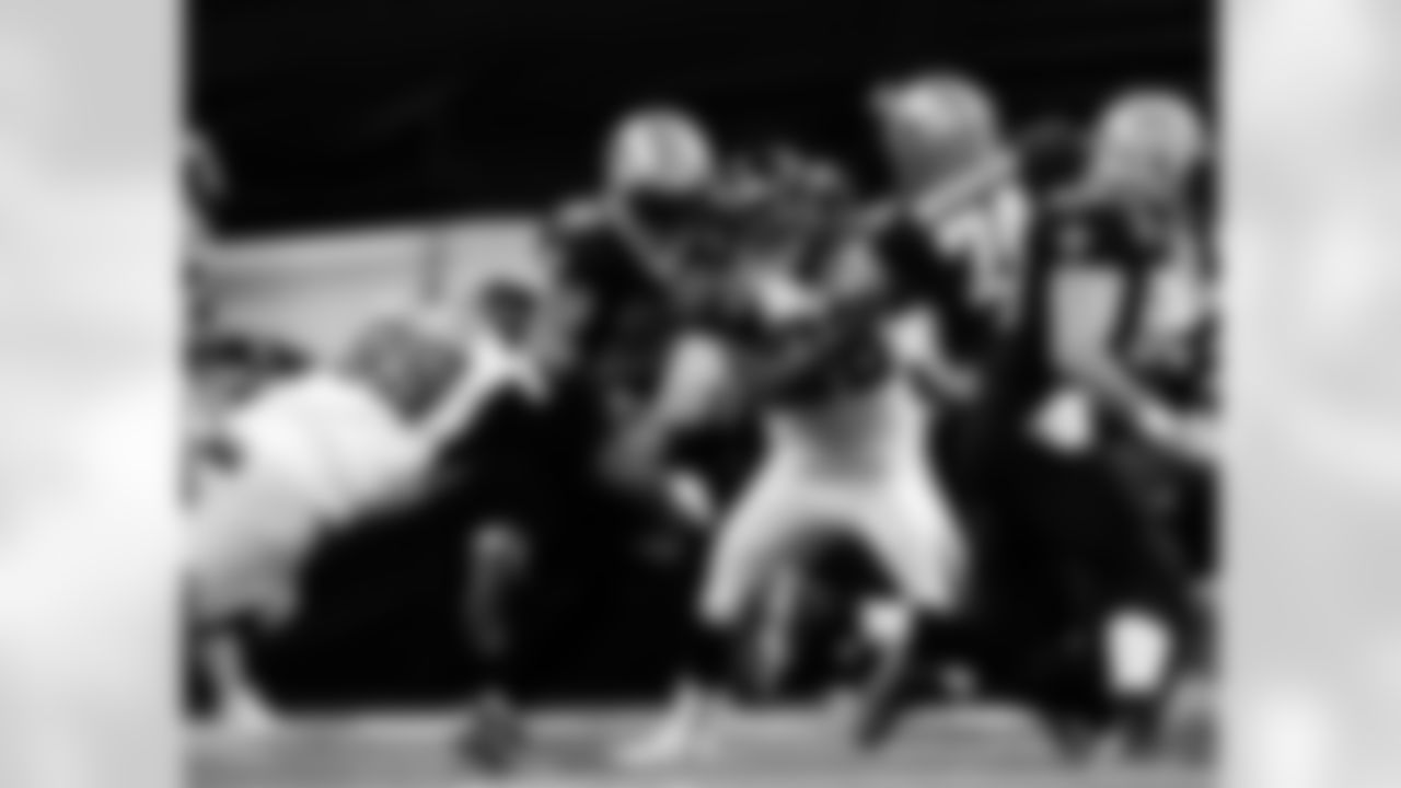 Revisit the NFC South rivalry with a look at some of the best photos of the New Orleans Saints vs. Atlanta Falcons matchups through the years.