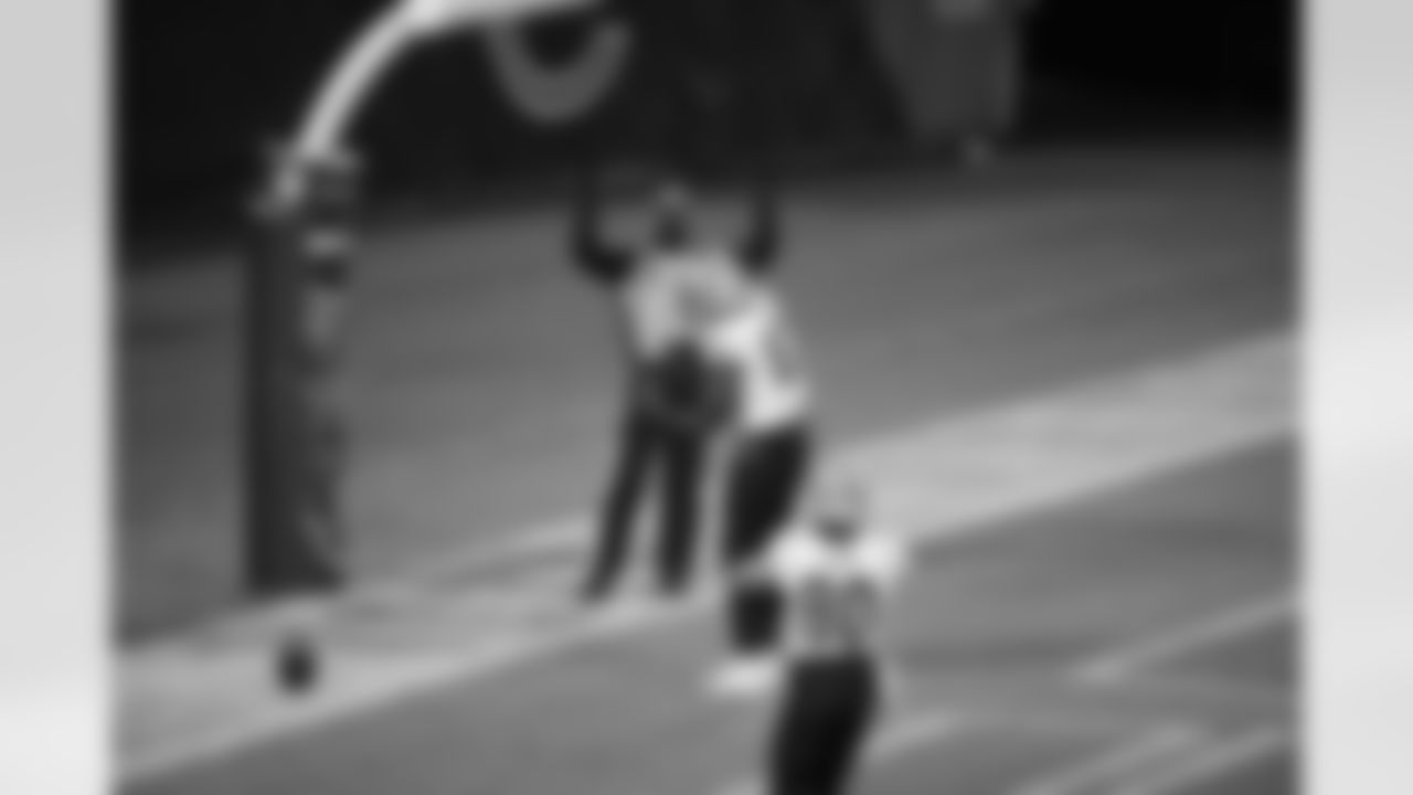 Game action photos from the New Orleans Saints at Chicago Bears matchup in Week 8 of the 2020 NFL season.