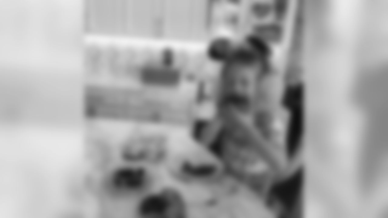 Drew Brees: Chocolate donuts and bacon for breakfast… With the pink ear muffs!