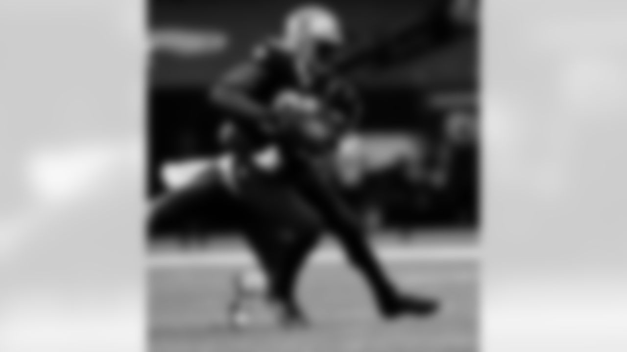 Game action photos from the New Orleans Saints vs. Chicago Bears matchup in the Wild Card round of the 2020 NFL playoffs.