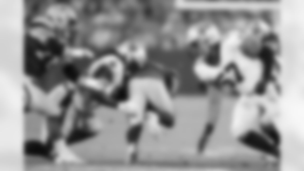 New Orleans Saints defensive linemen Albert Huggins (95) and Josh Black (57) in action during their 2022 Preseason Week 2 game against the Green Bay Packers.