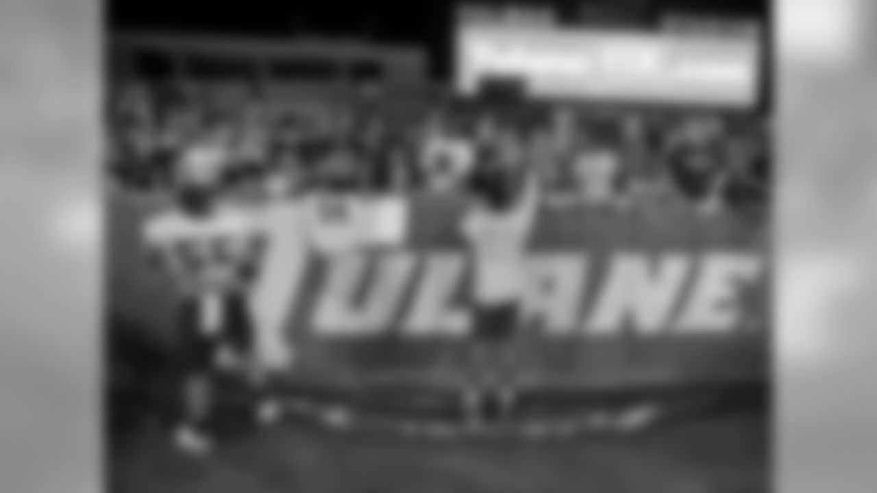 Players sign autographs after the New Orleans Saints held a 2019 training camp practice at Tulane University's Yulman Stadium on Sunday evening, August 4, 2019.