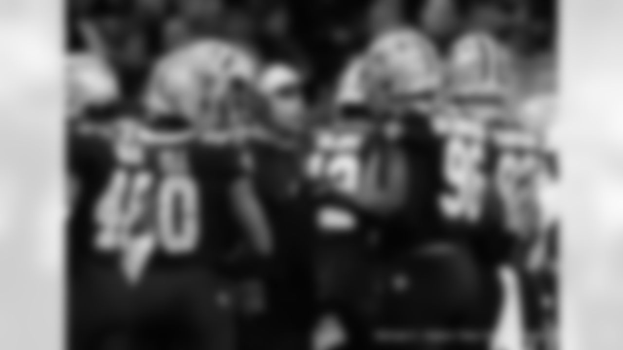 New Orleans Saints players in action during their 2022 Week 15 game against the Atlanta Falcons.