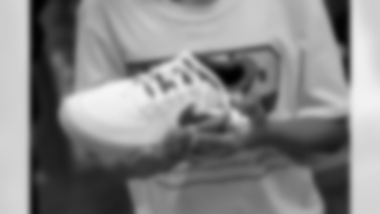 New Orleans Saints defensive end Cameron Jordan gifted dozens of kids from the Youth Empowerment Project (Y.E.P) with a pair of sneakers of their choice at Sneaker Politics in the French Quarter on Thursday, December 16, 2021.