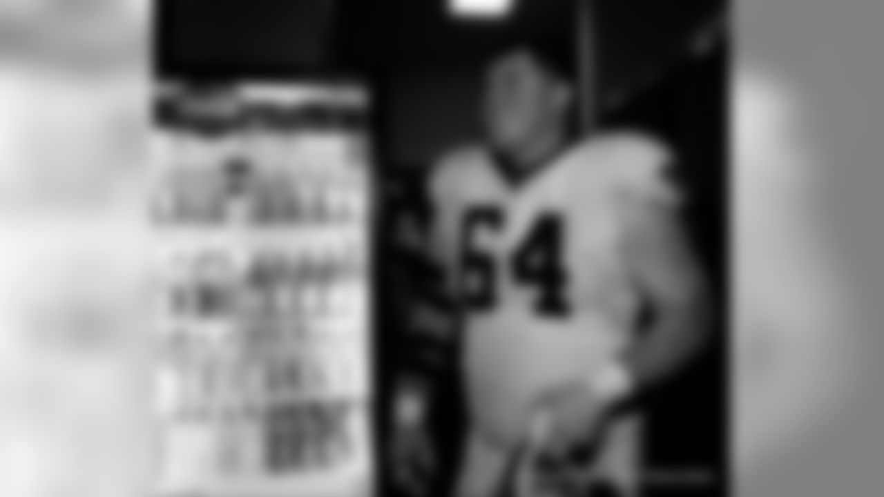 The New Orleans Saints celebrate their Week 16 win over the Tennessee Titans inside the locker room presented by Mercedes-Benz.