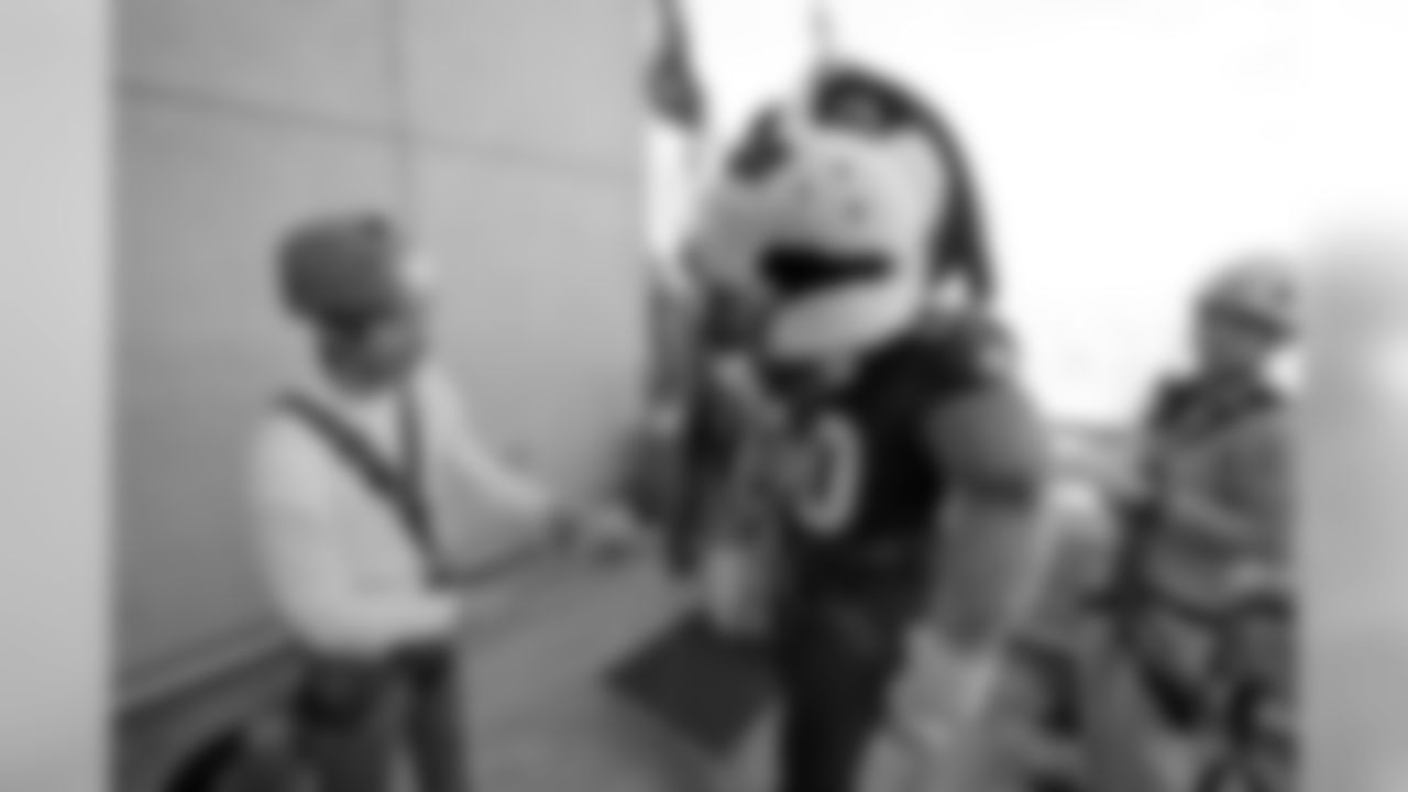 New Orleans Saints mascot Gumbo propelled down the side of Benson Tower on December 6 as part of a fundraiser for the Special Olympics.