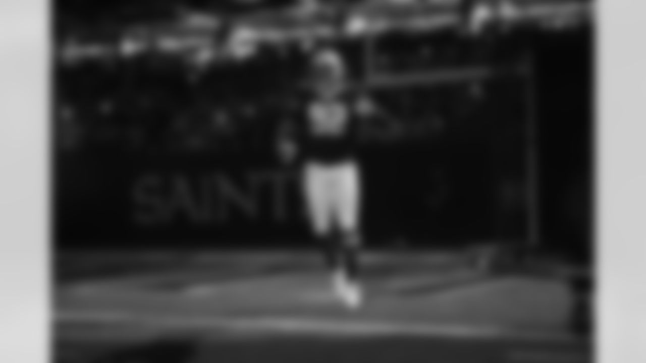 Check out photos of New Orleans Saints defensive end Marcus Davenport in action during the 2021 NFL season.