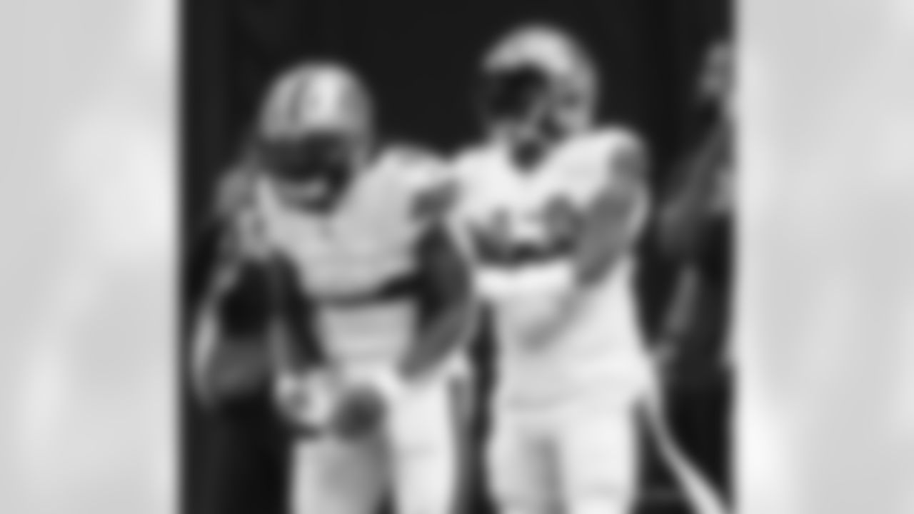 New Orleans Saints players and coaches prepare to take on the Tampa Bay Buccaneers in Week 8 of the 2021 NFL season.