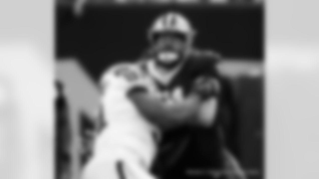 New Orleans Saints offensive lineman Ryan Ramczyk in action during their 2022 Week 8 game against the Las Vegas Raiders.