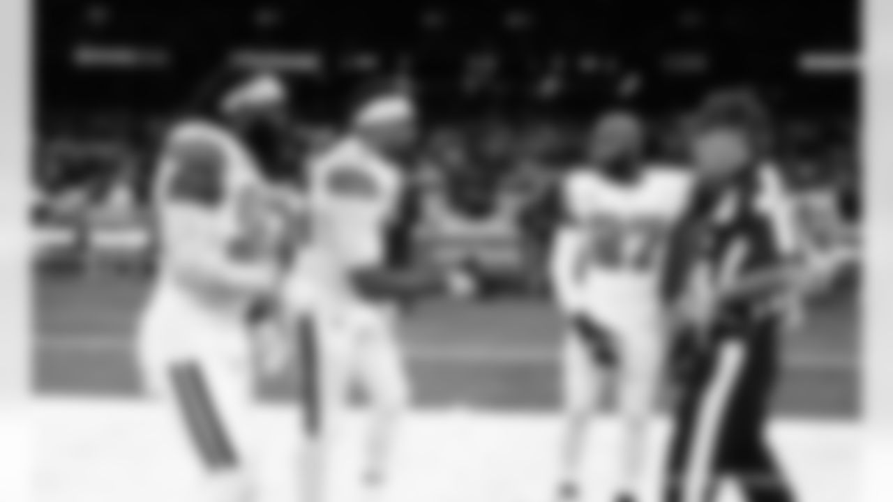 New Orleans Saints players and coaches prepare to take on the Tampa Bay Buccaneers in Week 8 of the 2021 NFL season.
