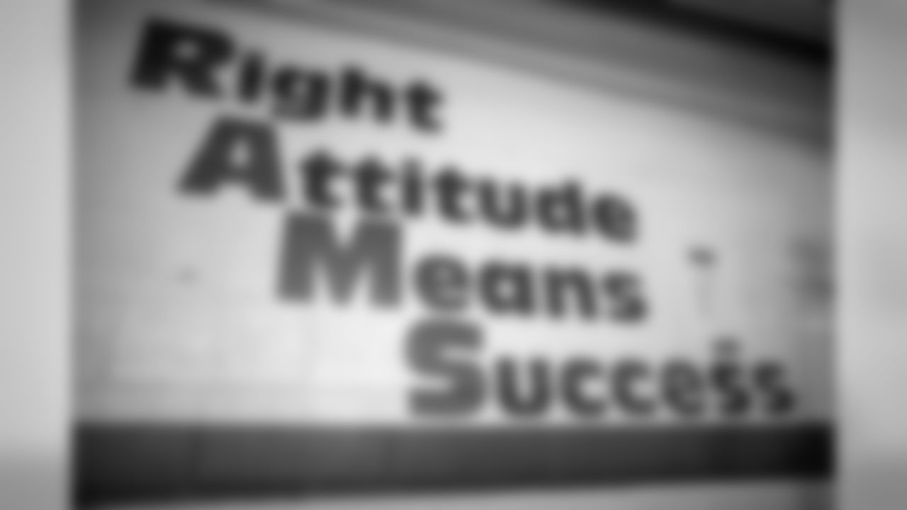 The high school motto of the Highland Rams written on the walls of the weight room where Taysom trained.