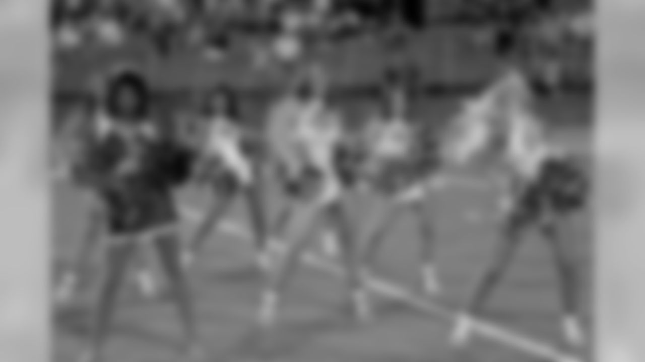 The Saintsations perform with the dance team from both schools at halftime during the NFL100 Fantennial game between Brother Martin and Jesuit at Tad Gormley Stadium on Friday, September 27, 2019. (Photo by Michael DeMocker)