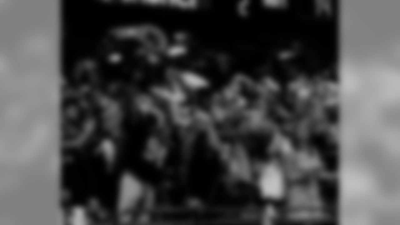 New Orleans Saints fans cheer on the team during their Week 12 game against the Caroline Panthers at the Mercedes-Benz Superdome.