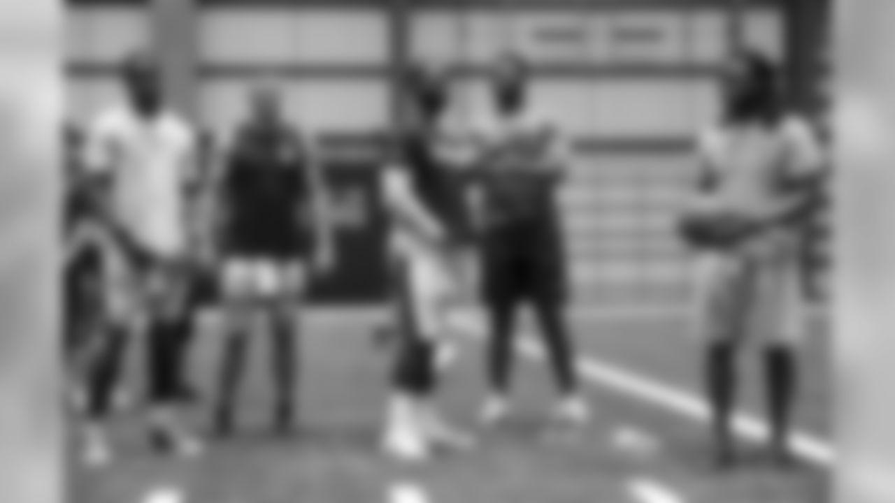 New Orleans Pelicans' Zion Williamson joins Drew Brees, the New Orleans Saints QB's, and Alvin Kamara in the Quarterback Challenge during Saints Training Camp presented by Verizon at Ochsner Sports Performance Center on July 29, 2019.
