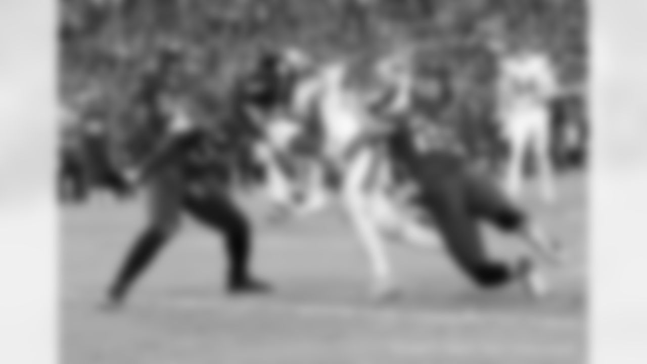 New Orleans Saints players in action during their 2022 Week 13 game against the Tampa Bay Buccaneers.