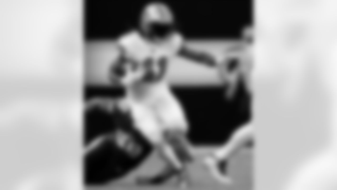 Check out photos of New Orleans Saints running back Alvin Kamara in action during the 2020 NFL season.