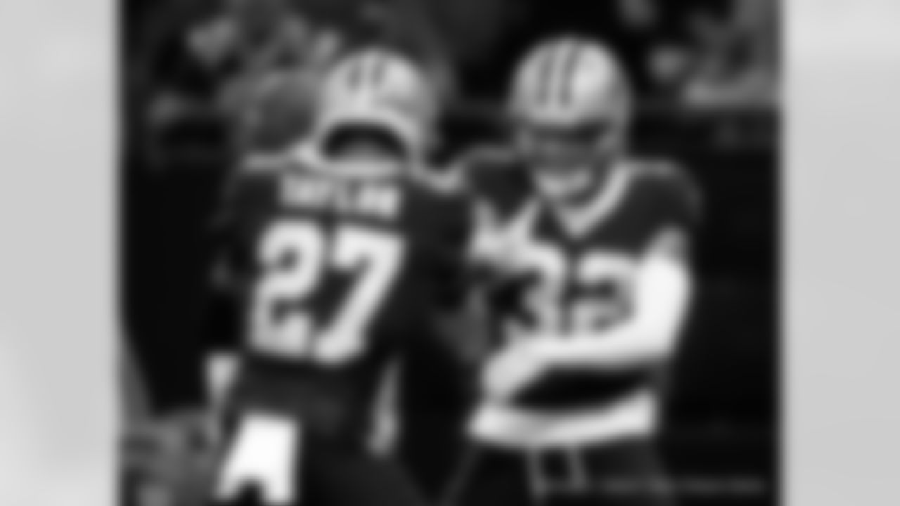 New Orleans Saints players in action during their 2022 Week 15 game against the Atlanta Falcons.