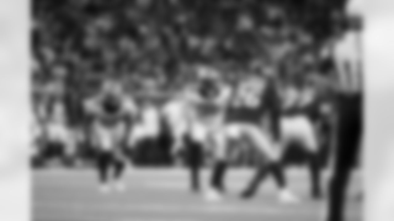 New Orleans Saints linebacker Eric Wilson and defensive end Carl Granderson in action during the 2022 Preseason Week 1 game against the Houston Texans.
