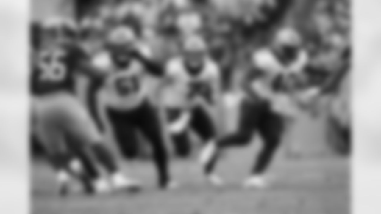Check out photos of the New Orleans Saints offensive linemen in action during the 2021 NFL season.