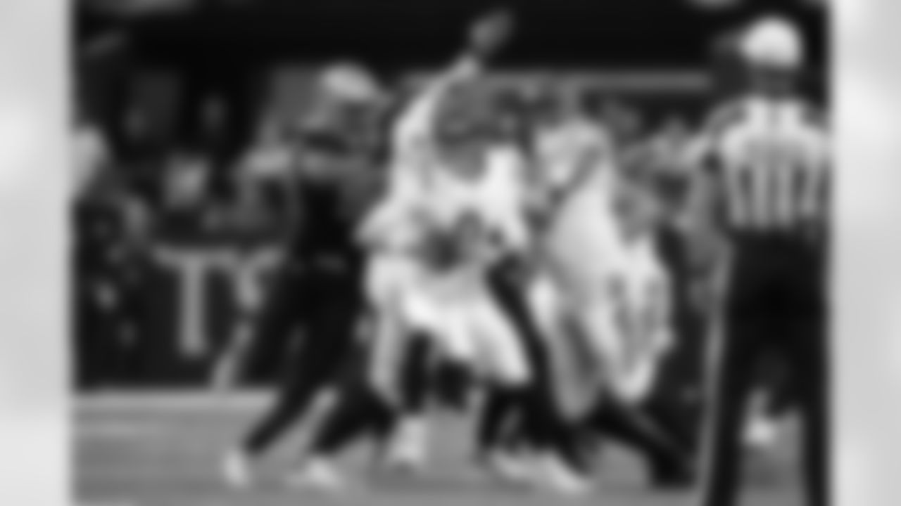 Check out photos of New Orleans Saints defensive end Marcus Davenport in action throughout the 2022 season.
