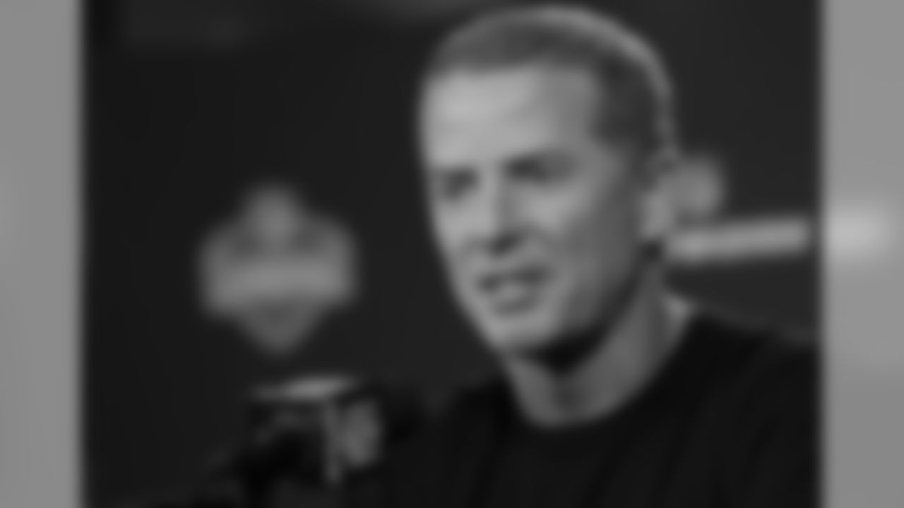 Dallas Cowboys coach Jason Garrett answers a question during a news conference at the NFL scouting combine in Indianapolis, Thursday, Feb. 20, 2014. (AP Photo/Michael Conroy)