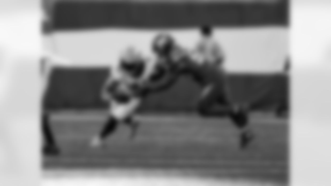 Check out photos of New Orleans Saints running back Alvin Kamara in action during the 2021 NFL season.