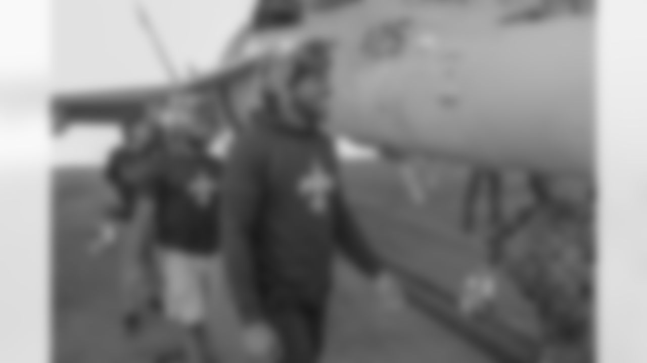 New Orleans Saints players visit with service men and women as well as tour the facilities at Naval Air Station Joint Reserve Base in Belle Chasse on October 30, 2018 as part of NFL "Salute to Service" week and a USAA initiative.