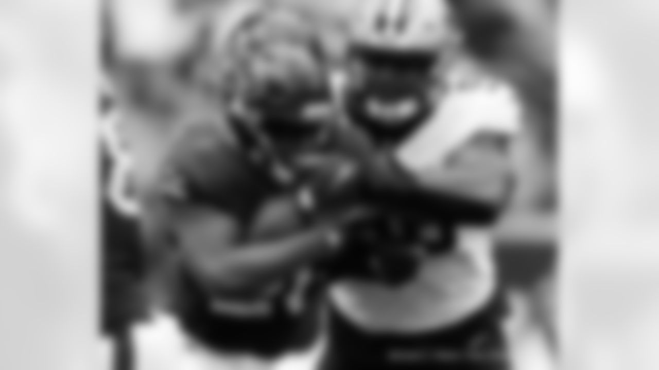 Check out the game action shots from the New Orleans Saints game against the Houston Texans in Week 6 of the 2023 NFL season including defensive end Carl Granderson (94).