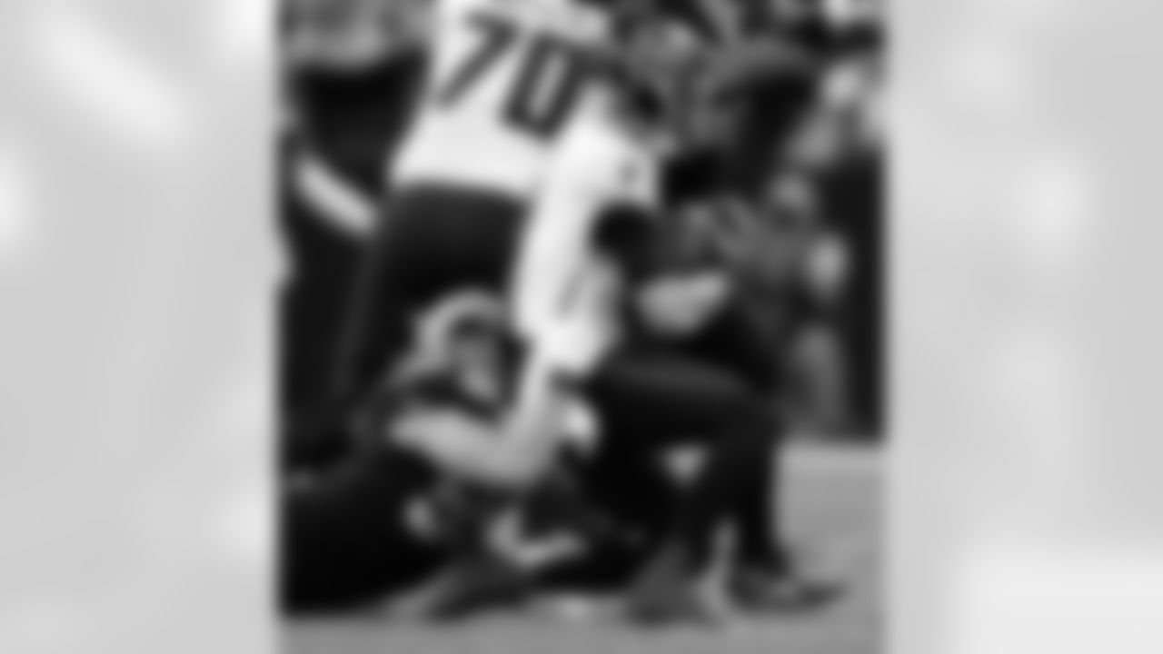 New Orleans Saints players in action during their 2022 Week 15 game against the Atlanta Falcons.