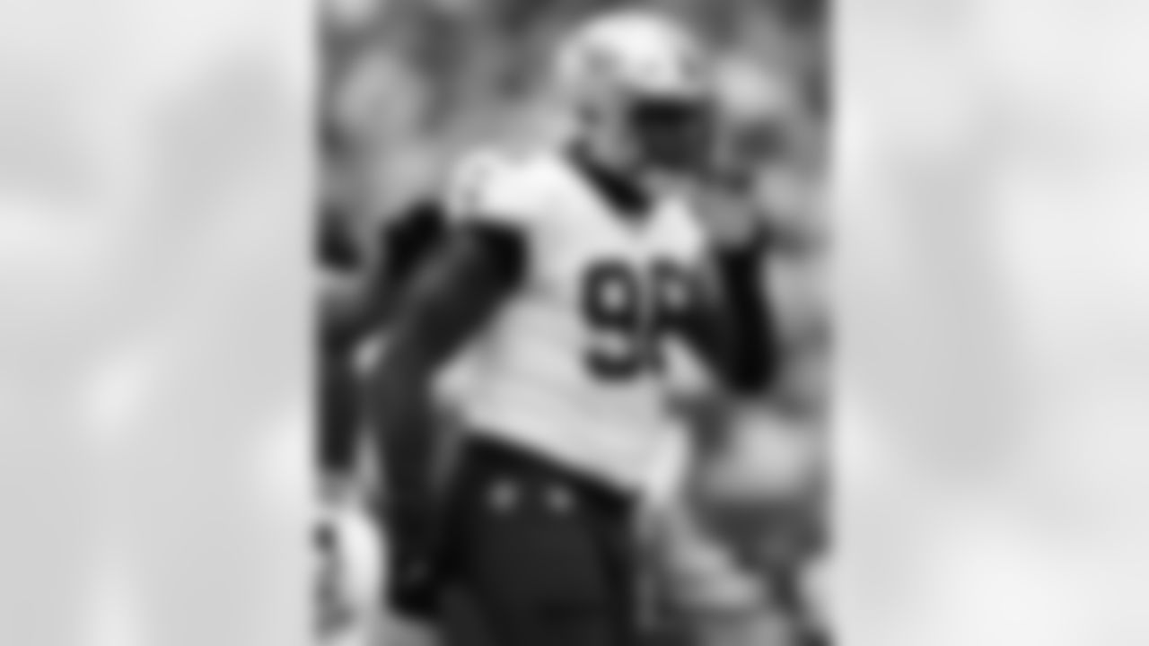 Check out the game action shots from the New Orleans Saints game against the Houston Texans in Week 6 of the 2023 NFL season including defensive end Carl Granderson (94).