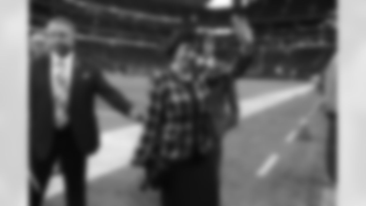 New Orleans Saints owner Gayle Benson waves before the first half of an NFL football game between the Atlanta Falcons and the New Orleans Saints, Sunday, Sept. 23, 2018, in Atlanta. (AP Photo/Mark Humphrey)