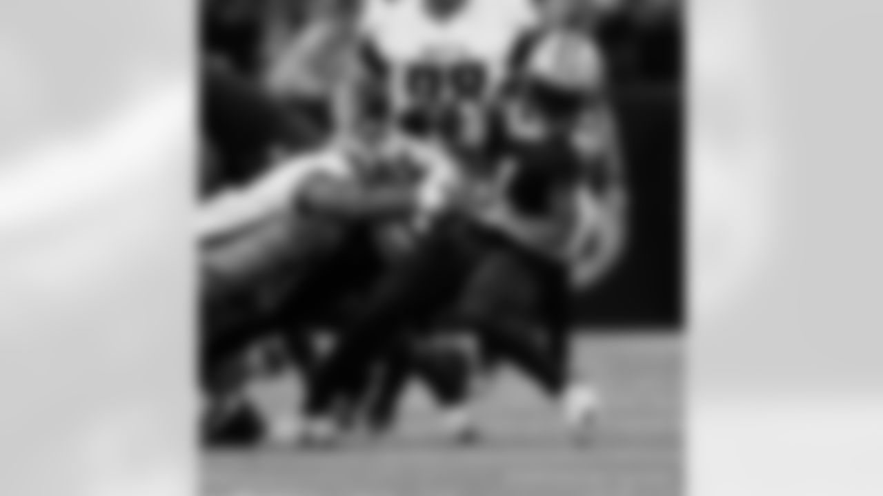 New Orleans Saints players in action during their 2022 Week 15 game against the Atlanta Falcons.
