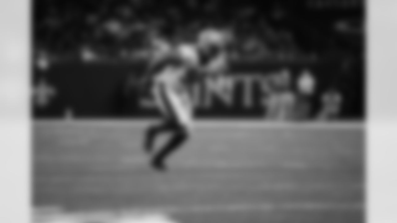 Check out photos of New Orleans Saints defensive end Marcus Davenport in action during the 2021 NFL season.