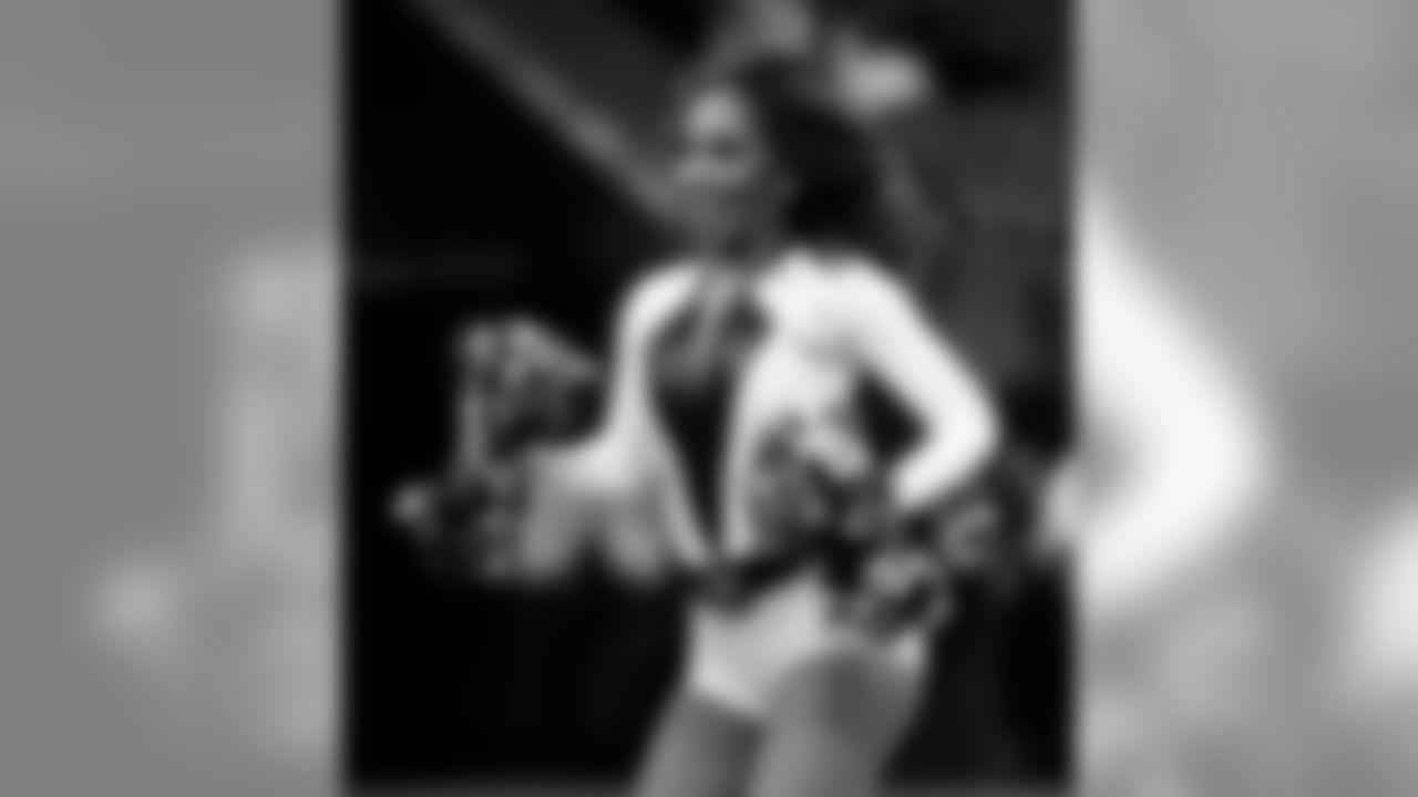 Check out photos of Saintsations member Deneé in action during 2019 Saints NFL season.
