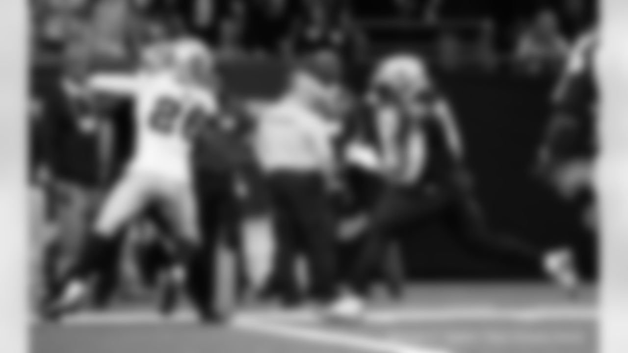 New Orleans Saints players in action during their 2022 Week 8 game against the Las Vegas Raiders.