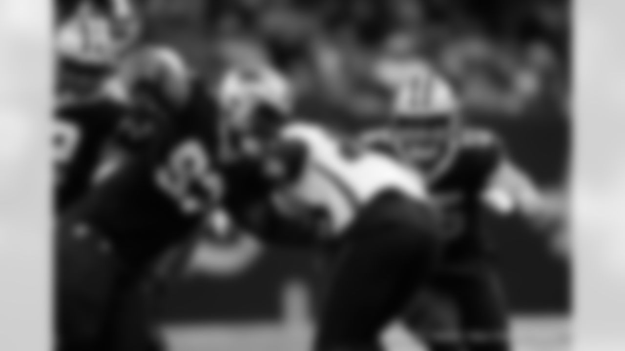 New Orleans Saints players in action during their 2022 Week 15 game against the Atlanta Falcons.
