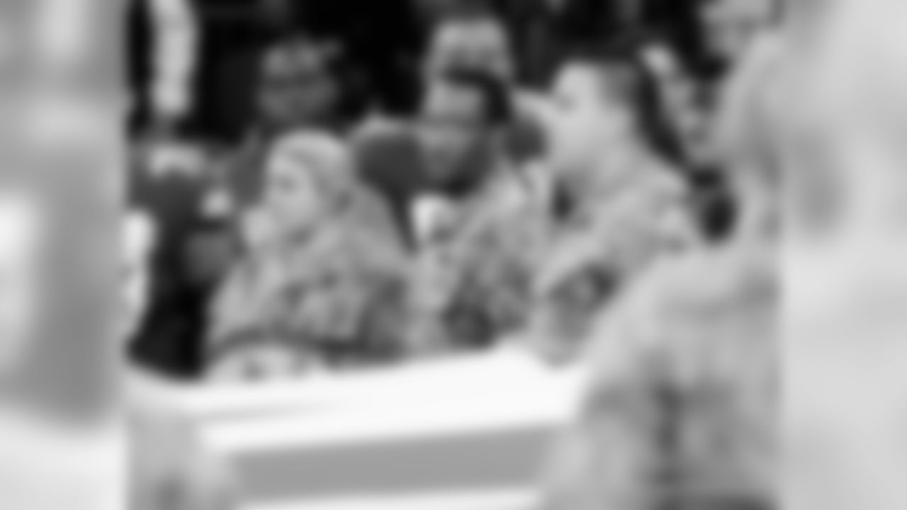 New Orleans Saints fans cheer on the team against the Minnesota Vikings at the Mercedes-Benz Superdome.