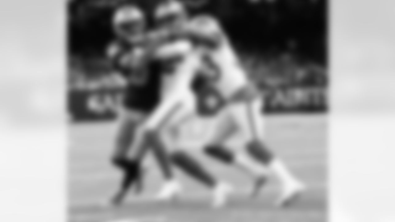New Orleans Saints players in action during their 2022 Week 11 game against the Los Angeles Rams.