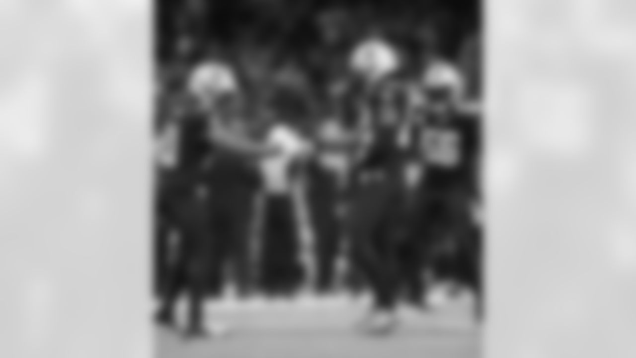 New Orleans Saints players in action during their 2022 Week 5 game against the Seattle Seahawks.